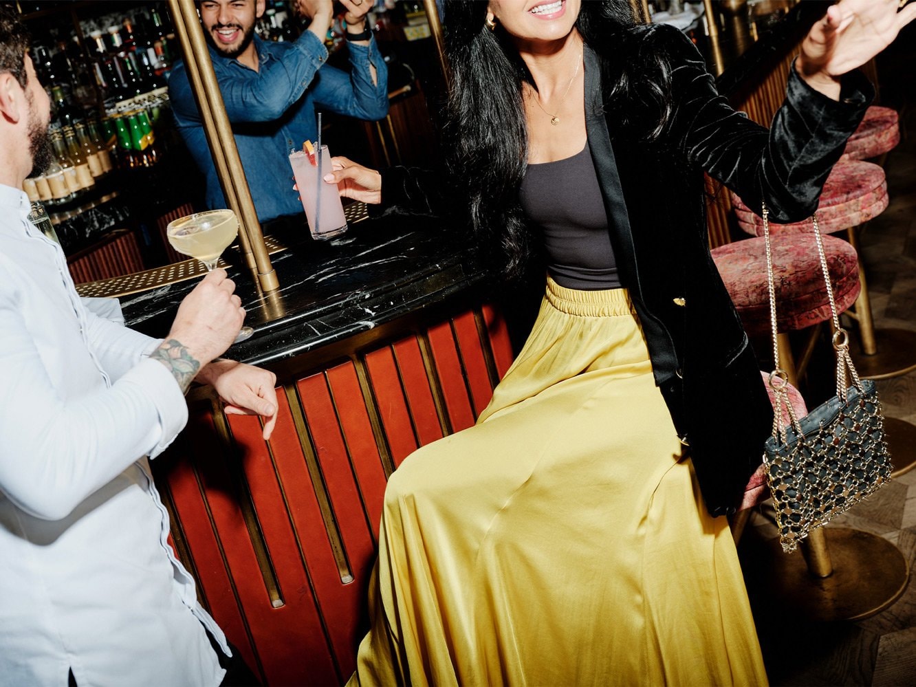 People enjoying drinks at a bar