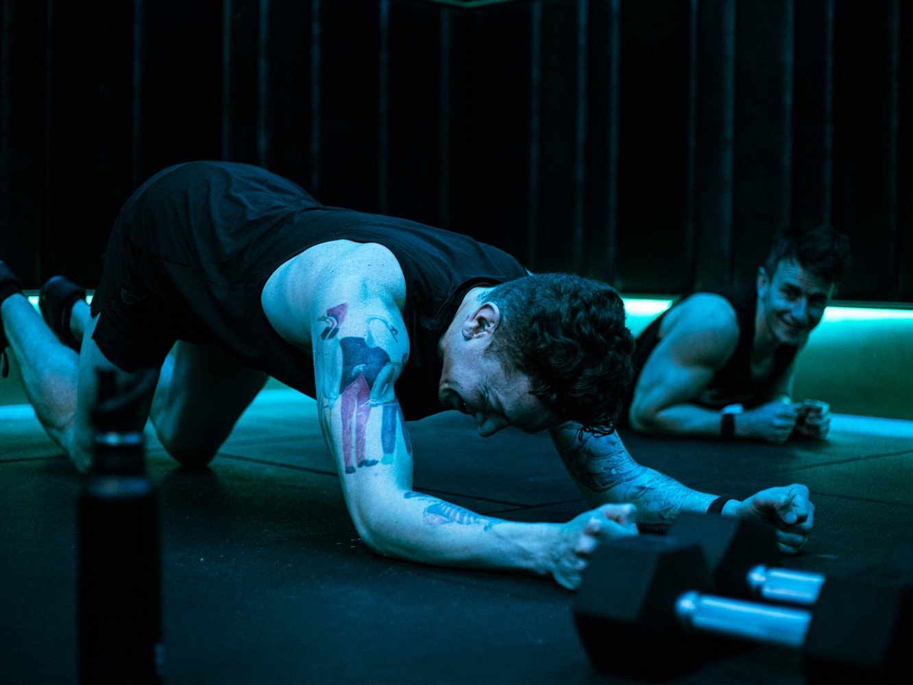 Two people working out at The Dean Power Gym