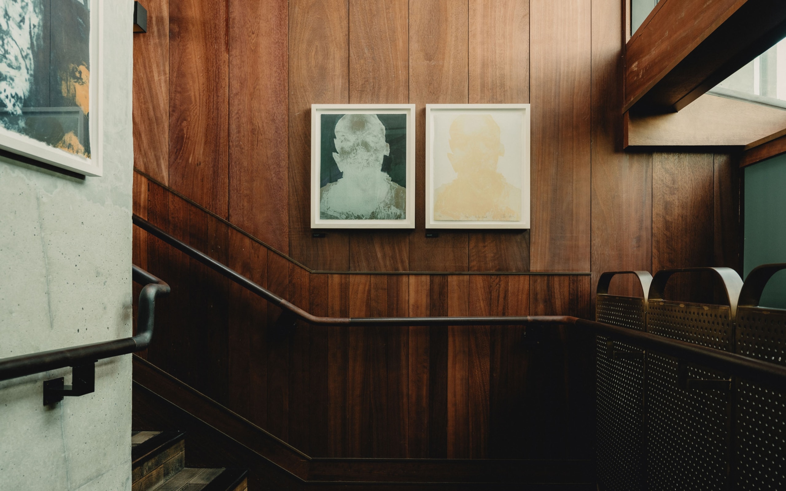 Stairway with art on the wall