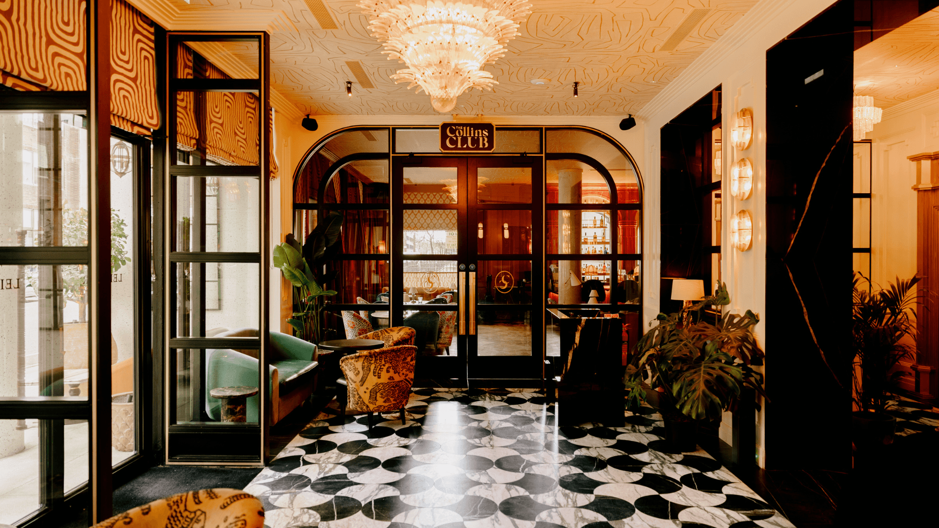 The Collins Club entryway with glass doors