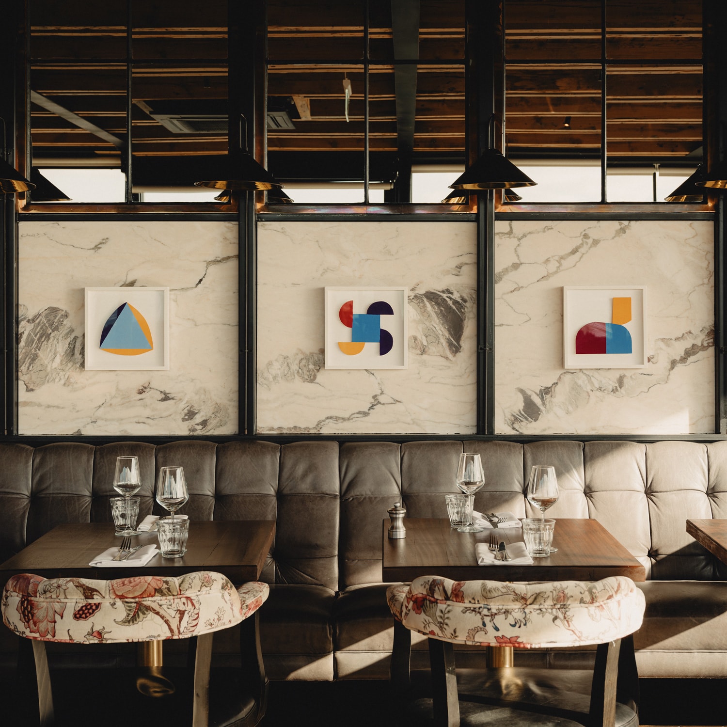 Tables set in Layla's restaurant of The Devlin Hotel.